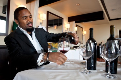 schacol01, fea, lynn, 3.-Green Bay Packer and winery owner Charles Woodson with a few bottles of his wine talks about how he became interested in wine Thursday April 14, 2011 at Bacchus-A Bartolotta Restaurant. Photo by Tom Lynn/TLYNN@JOURNALSENTINEL.COM